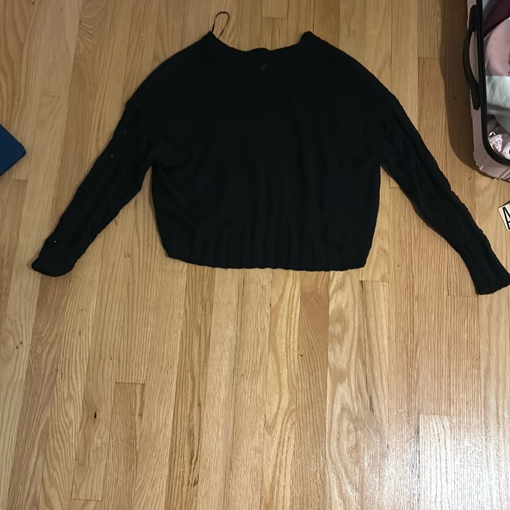 Black sweater with lacy sleeves